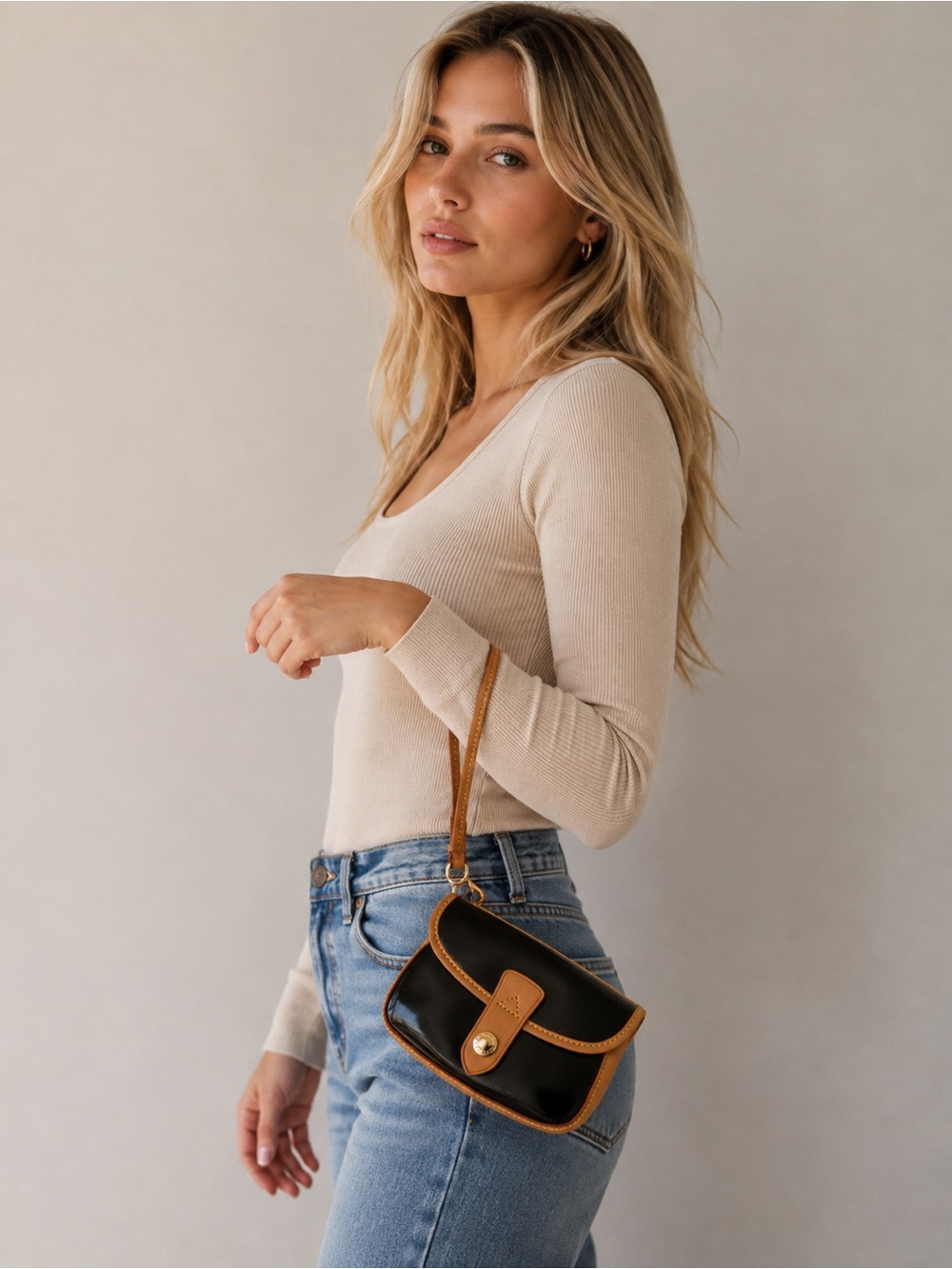 Dooney & Bourke Black and Brown Wristlet